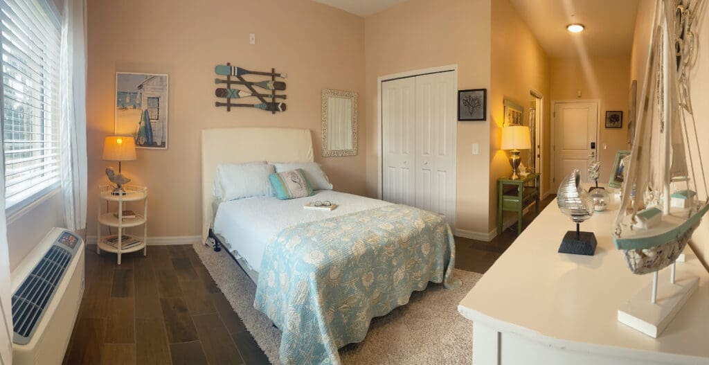 Interior bedroom at Palm Bay Memory Care, a community offering senior living.